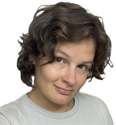 Portrait of Candy, standup comedian, smiling at the camera.